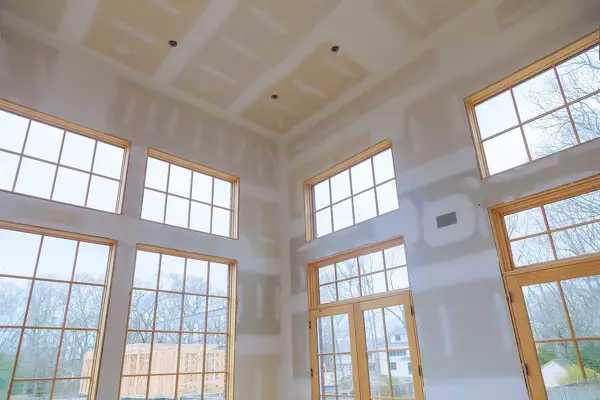 Xavier Drywall Service crew finishing interior drywall in Bradenton, FL